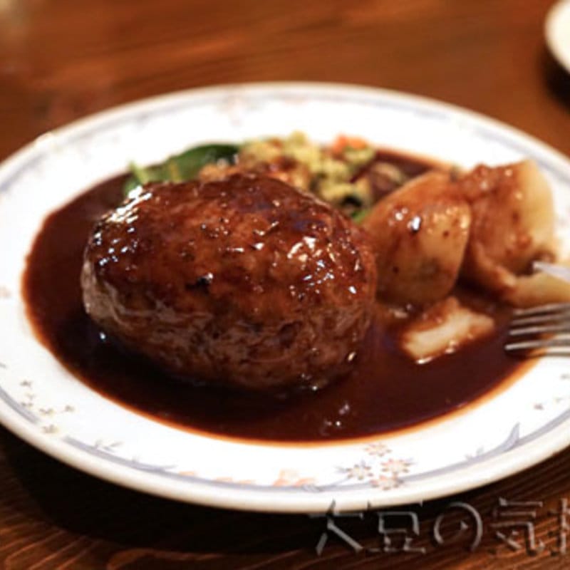 子羊肉のグリル・ド・ハンバーグ(赤ワインソース)(クリスチアノ)の写真