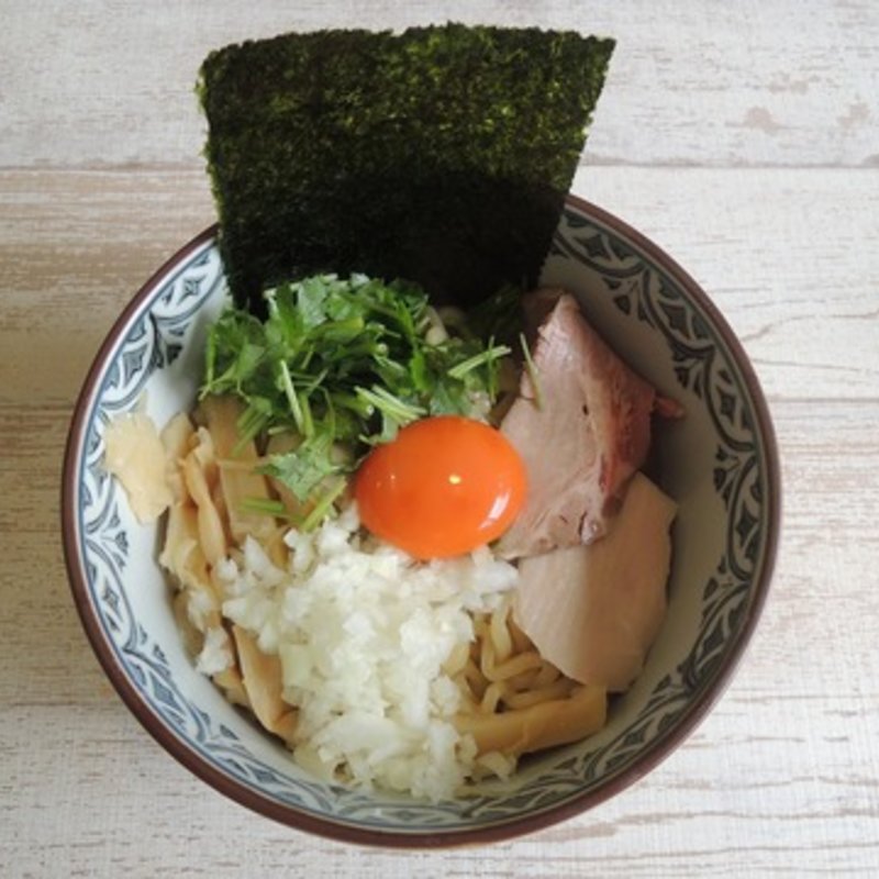 濃厚たまごのまぜそば(中華そば 四つ葉)の写真