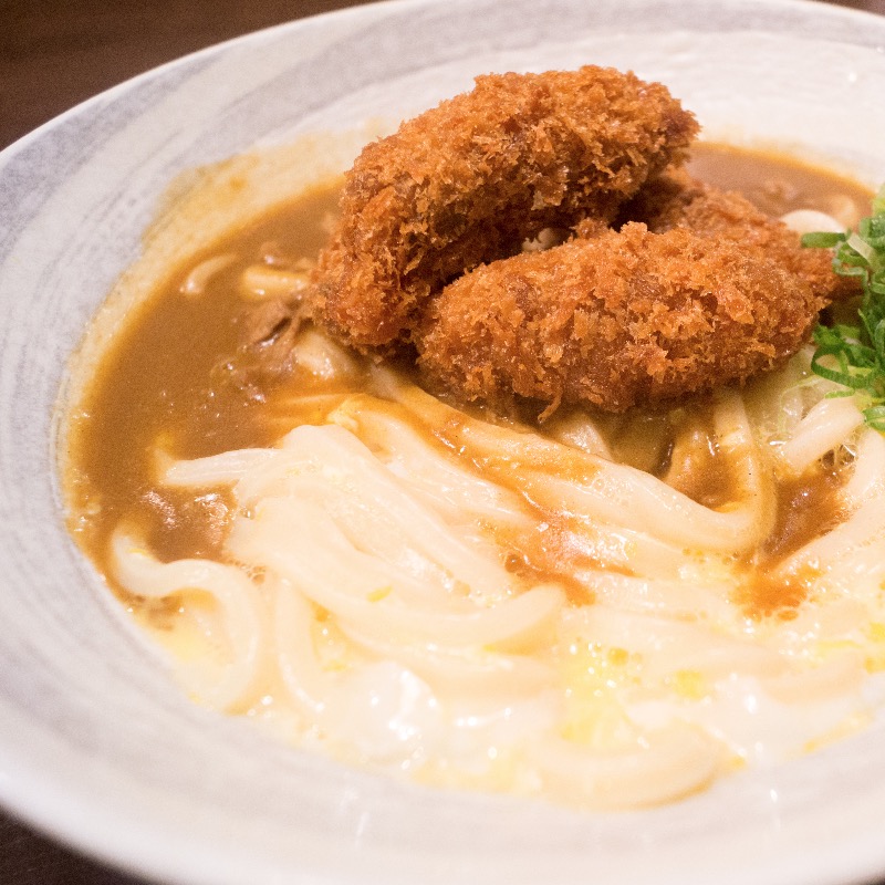 カキフライカレー釜玉(情熱うどん 讃州 （じょうねつうどん さんしゅう）)の写真