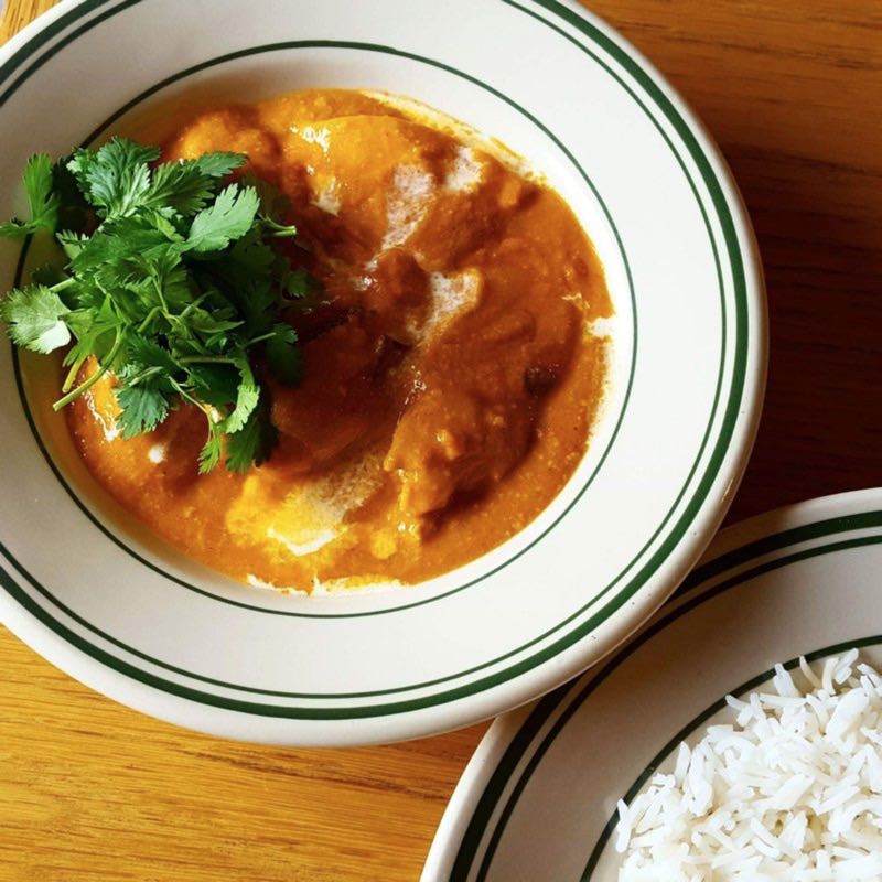 梅バターチキン(肉とスパイス JINDARI)の写真