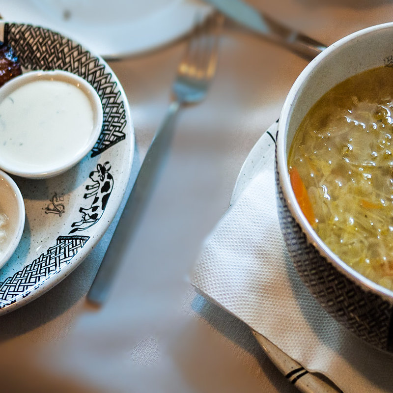 Sauerkraut soup served with pork ribs glazed in honey and mustard and fried potatoes(Restaurant "1221")