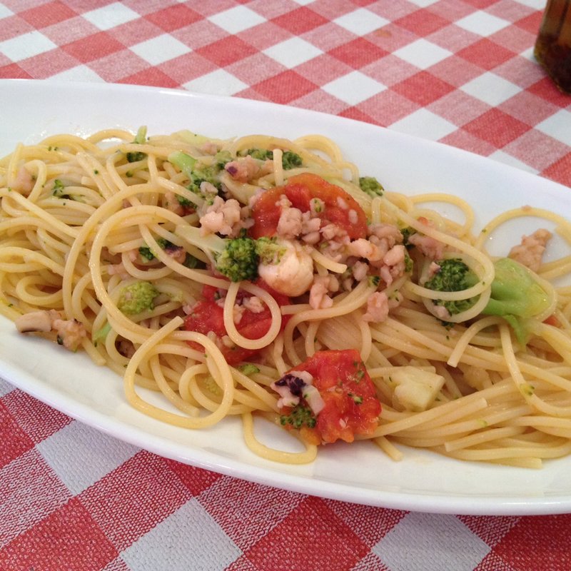 PranzoA（イカゲソとチェリートマトのスパゲッティ）(ピッツェリア キアッキェローネ PIZZERIA CHIACCHIERONE)