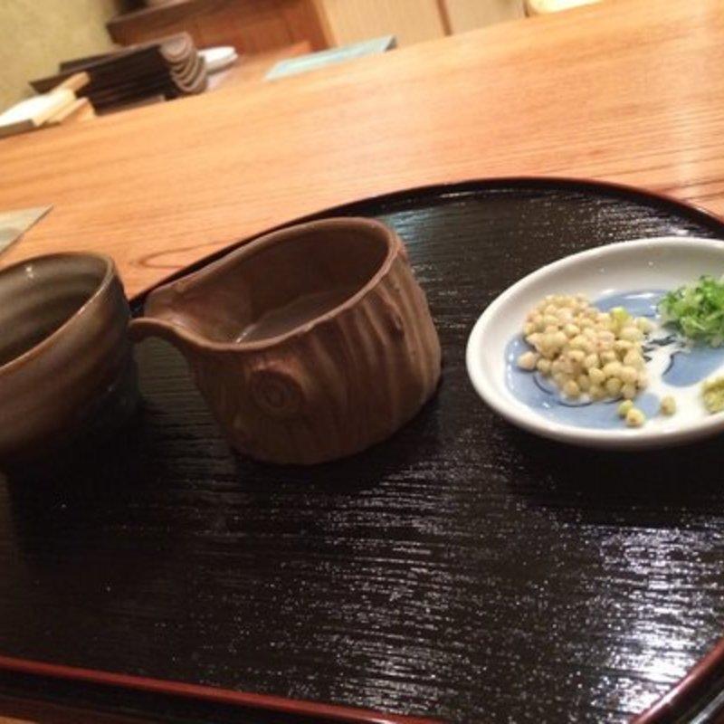 Soba broth with soba cooking water and buckwheat, scallions, and wasabi(Cagen Japan Restaurant)