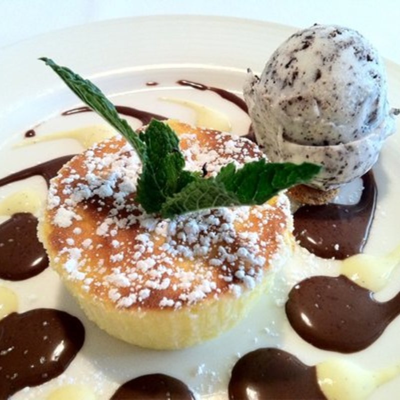 Ricotta and pear tortino with chocolate sauce, cream and chocolate chip gelato(Vincenti Ristorante)