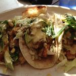 Tempeh tacos with avocado and pine nuts