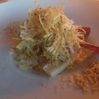 Pear Salad, warm caramelized pear, frisée, apple cider dressing, goat cheese fondue, bacon, toasted walnut(RIVER CAFE)