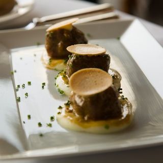 Lamb Meatballs, with a peppercorn gravy and potato puree topped with a chip(RIVER CAFE)
