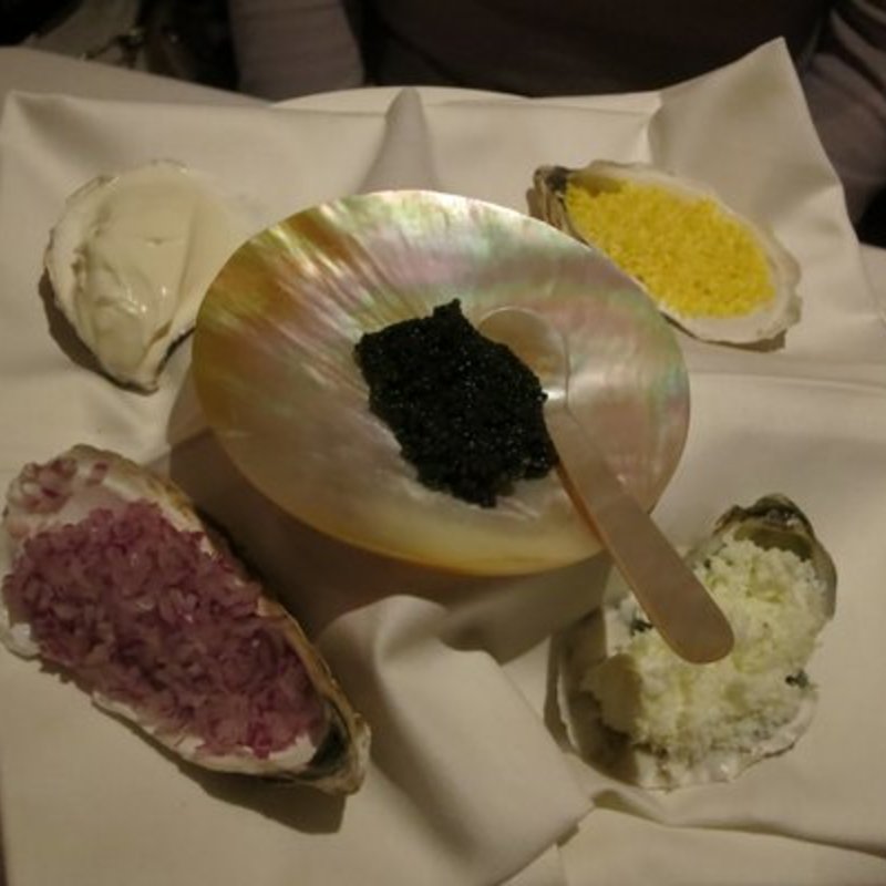 Royal sterling caviar served with creme fraiche, finely chopped egg yolks, egg whites and red onion(Aquagrill)