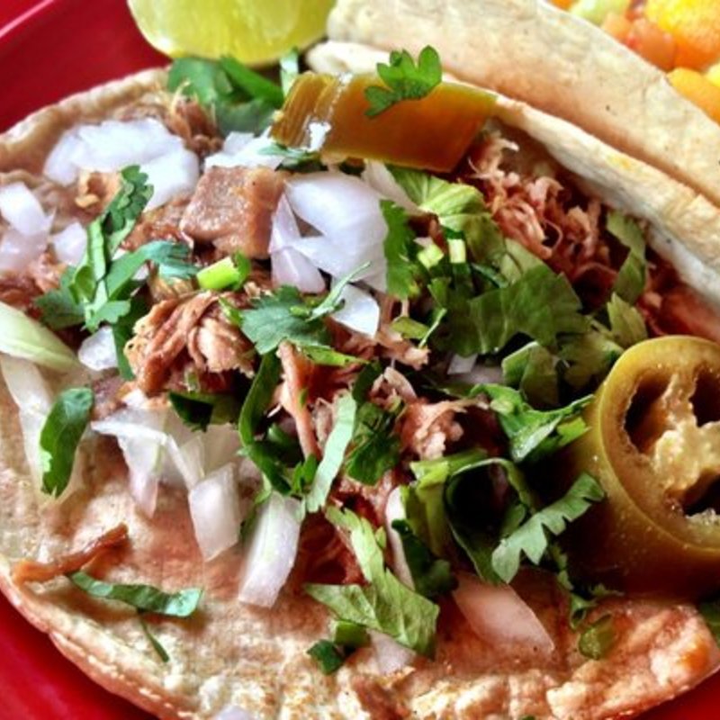 barbacoa taco - seasoned lamb steamed in maguey leaves, onions(Tortilleria Nixtamal)