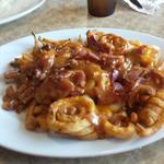 Brownstone Fries - Curly Fries with bacon, cheddar, mozzarella and tangy bbq or ranch