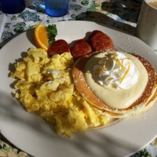 Scrambled eggs, Portuguese sausage and lilikoi pancakes(Moke’s Bread )