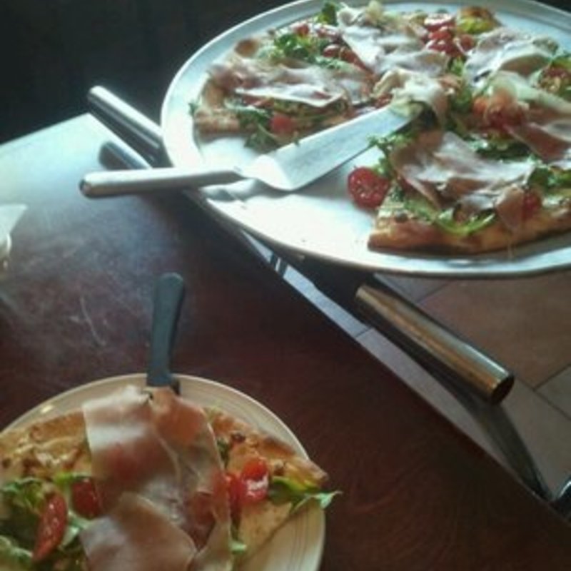 Pizza Sorrentina ~ prosciutto, cherry tomatoes, fresh arugula, grated pecorino romano, mozzarella(Trattoria La Sorrentina)