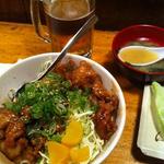 Sweet and sour pork belly over rice