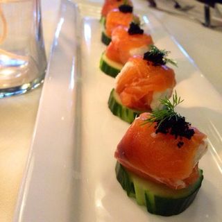 Gravlax Salmon Roulade with Cream Cheese on Cucumber Chips(Chef Chai)