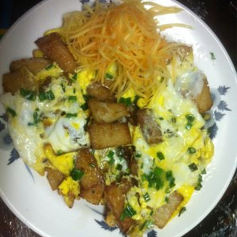 Fried rice cake top with egg(Ngon Vietnamese Cuisine)