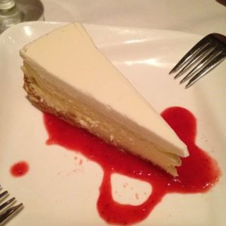 homemade cheesecake with strawberry purée(Paesano)