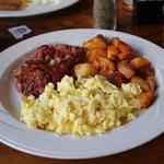 Corned beef hash, potatoes and scrambled egss