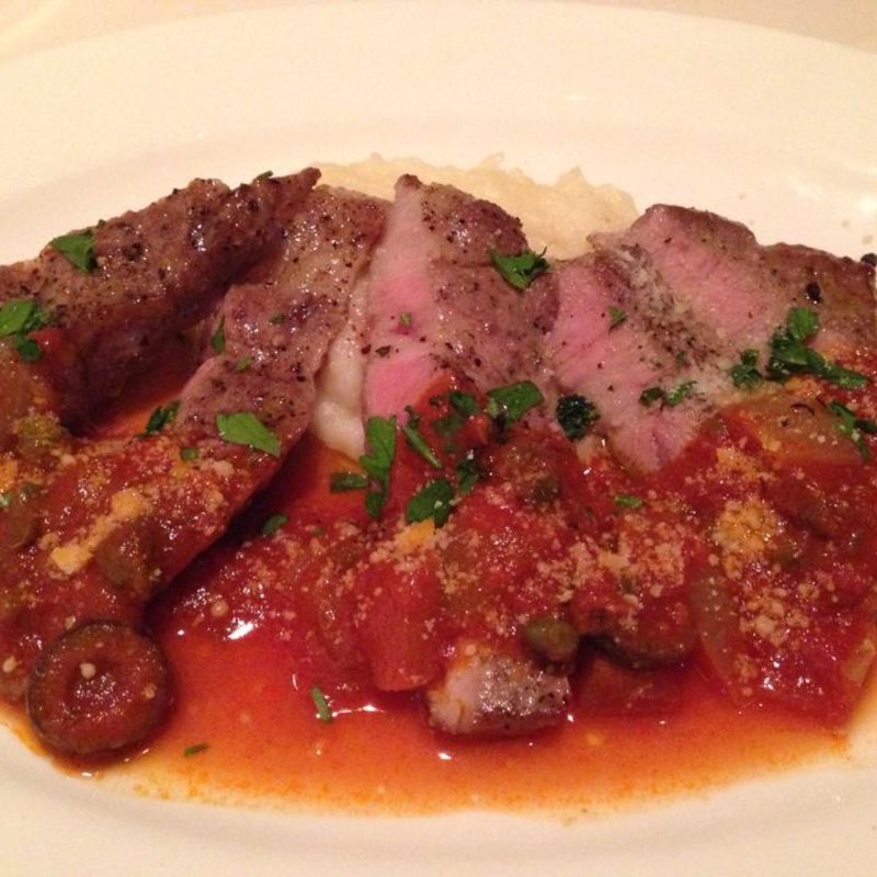 宮崎産「南の島豚」のアッロスト　プッタネスカピカンテ(Ristorante SILVERADO)