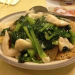 Rice noodle cake pan fried with fish and choy sum