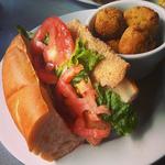 Fried tilapia sandwich(Hughley’s Southern Cuisine)