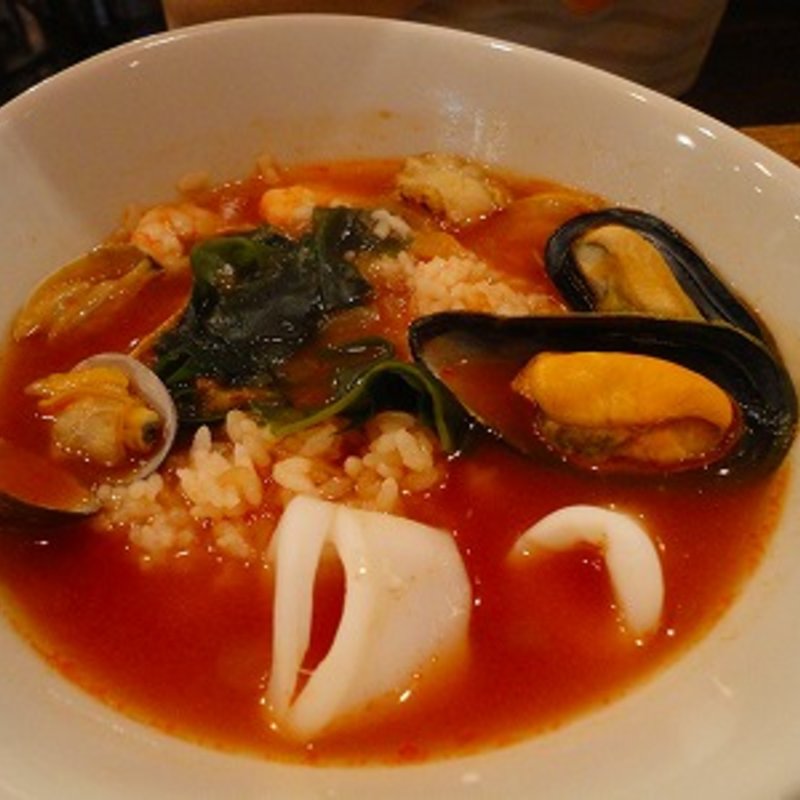 雑炊（ﾄﾏﾄﾍﾞｰｽで魚貝類入り）(エルチャテオ 銀座店)