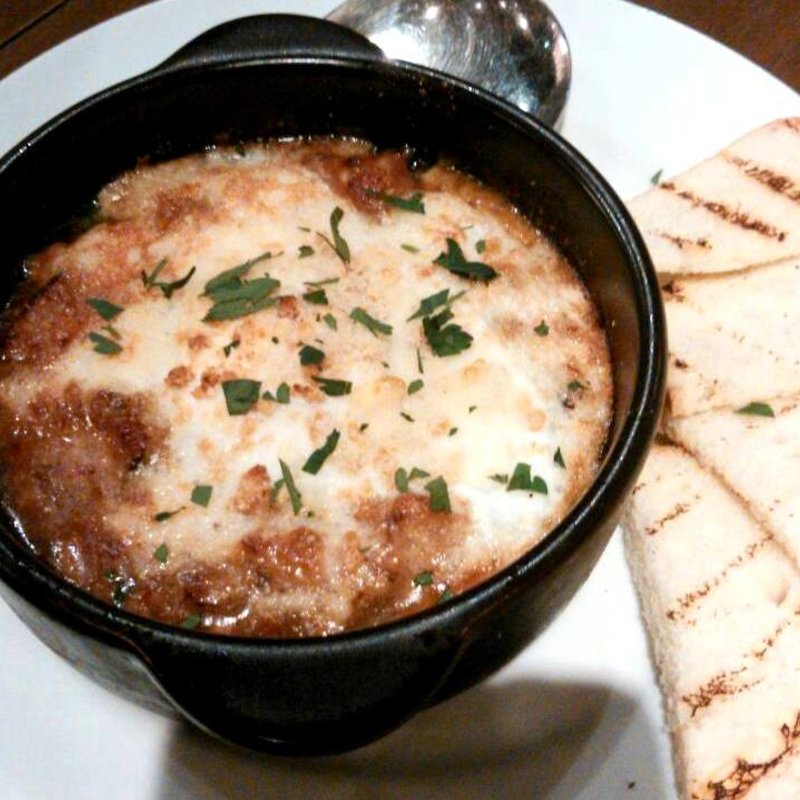 牛トリッパとイベリコ豚の煮込みグラタン仕立て(オステリア オロビアンコ （Orobianco）)