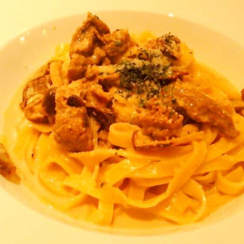 仔牛とキノコ、ボルチーニ茸の煮込み　ラグーソース(アンシャンテ ハービス梅田 （Enchante Herbis Umeda）)