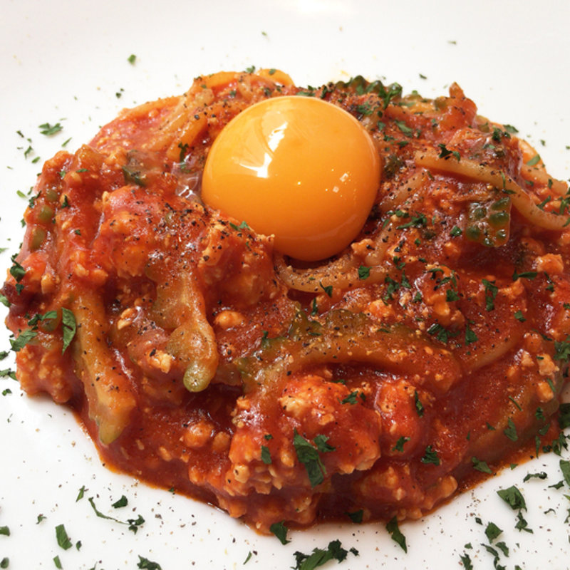 鶏そぼろとゴーヤのトマトソース 卵黄のせ(ポルトベッロ （Porto Bello）)