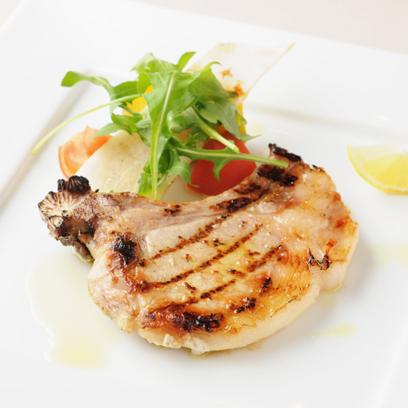 骨付きイベリコ豚ロースの炭火焼き(クオーレ ディ ローマ)