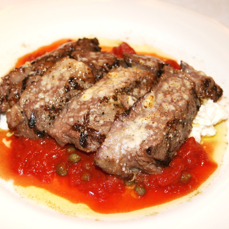 牛リブロースのハーブチーズ焼き　ピッツァイオーラ風 (Bar＆Grill RIPOSO)