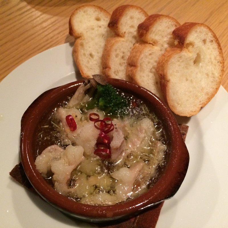 ホルモンのアヒージョ(BISTRO うしすけ （【旧店名】DUMPLING NEW YORK）)