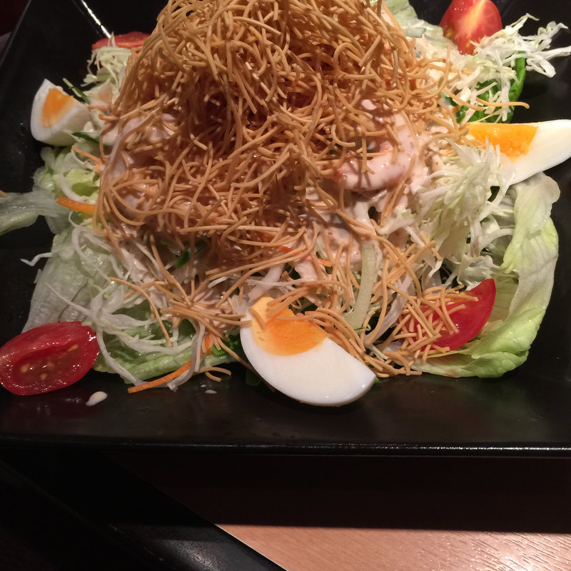 特製サラダ「ゴマだれ」(焼肉屋さかい 京都一乗寺店 （ヤキニクヤサカイ）)