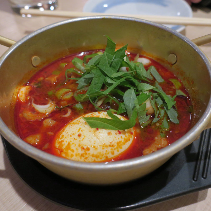 モツ煮込み 玉子入り(大衆おっさんパラダイス モツの朝立ち)