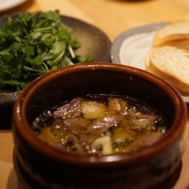 砂肝とハツのアヒージョ香草添え(観音坂 鳥幸)