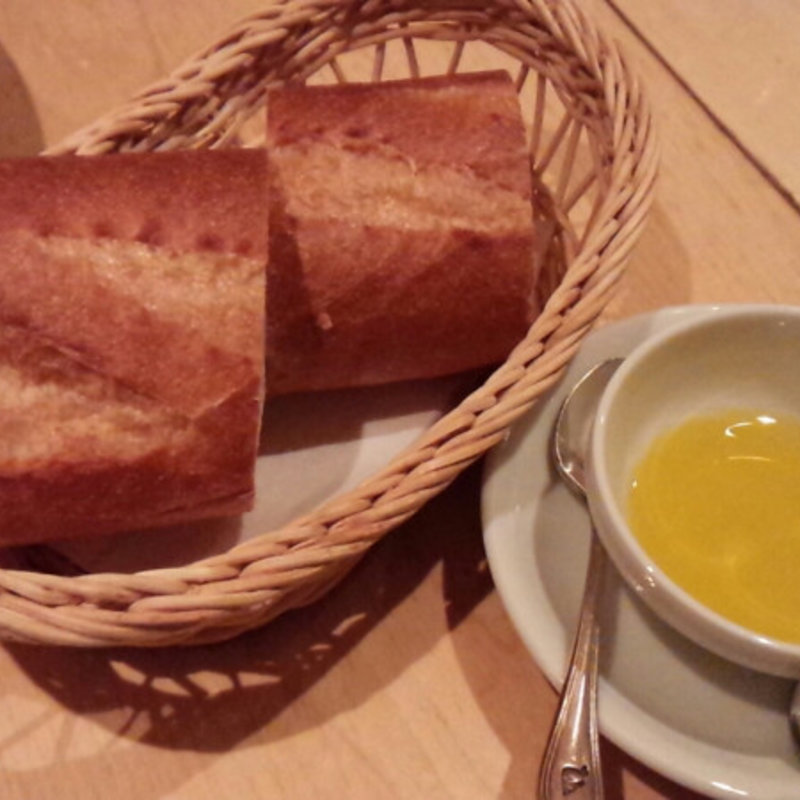 フランスパンとオレンジオリーブオイル　(バラッカ （BARACCA）)