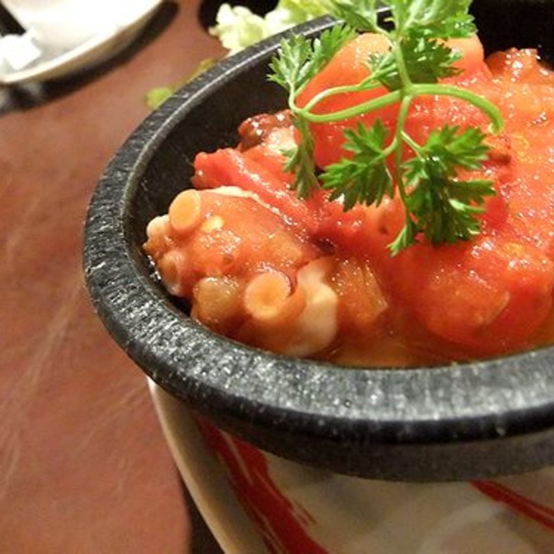 生タコと完熟トマトのピリ辛ガーリック炒め(エルボラーチョ・カンティーナ 博多店)