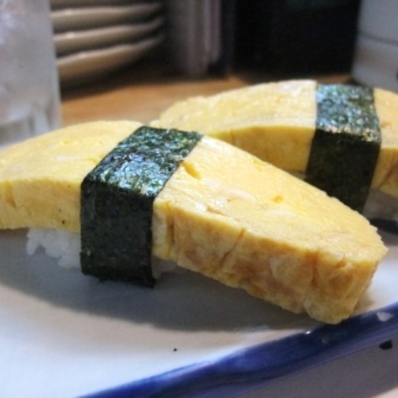 タマゴ(立ち寿司 まぐろ一徹 京橋店)