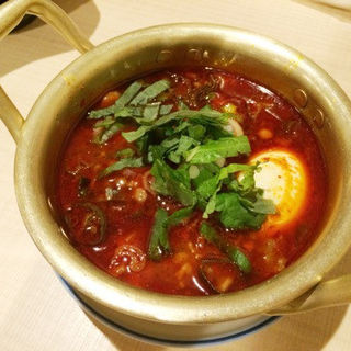 モツ煮込み 玉子入り(大衆おっさんパラダイス モツの朝立ち)