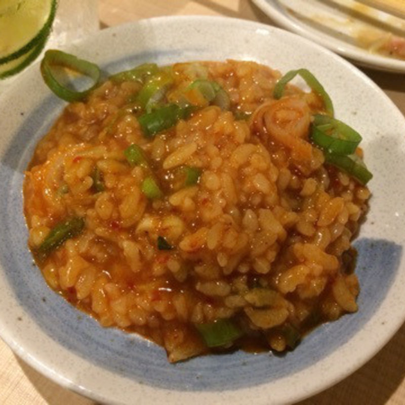 モツ煮込みのスープで作った雑炊(大衆おっさんパラダイス モツの朝立ち)