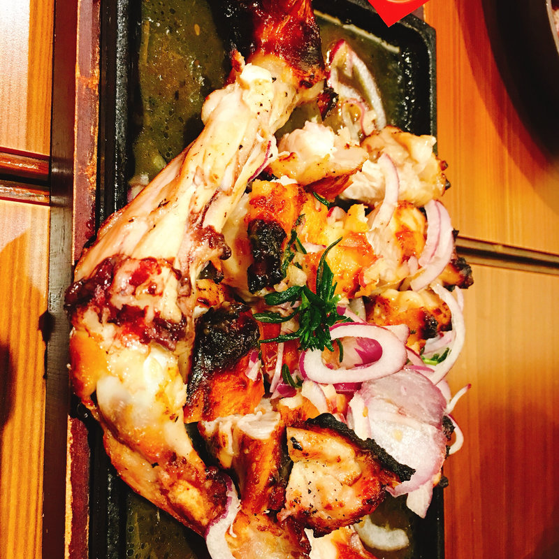 清流若鶏モモ一本グローブ焼き ローズマリー香るソテーオニオンソース(旨唐揚げと居酒メシ ミライザカ 天満橋店)