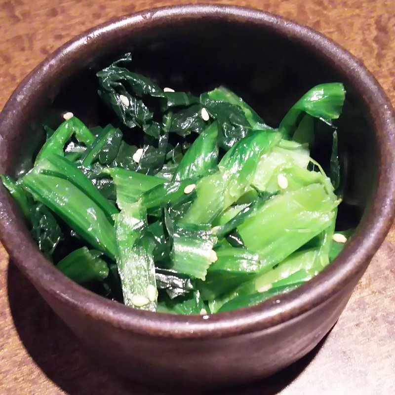 お通し（ほうれん草のお浸し）(居酒屋 土間土間 武蔵溝の口店)