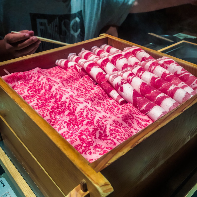 黒牛と黒豚の蒸籠蒸し(鹿児島 華蓮)