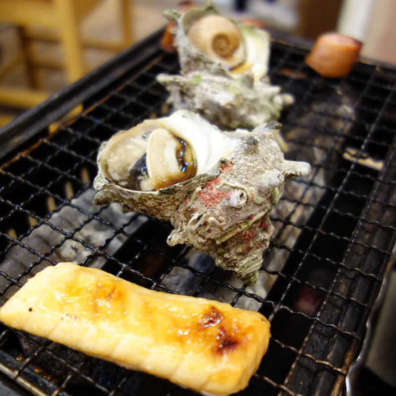 活サザエの壺焼き1個(磯丸水産 中洲川端店)