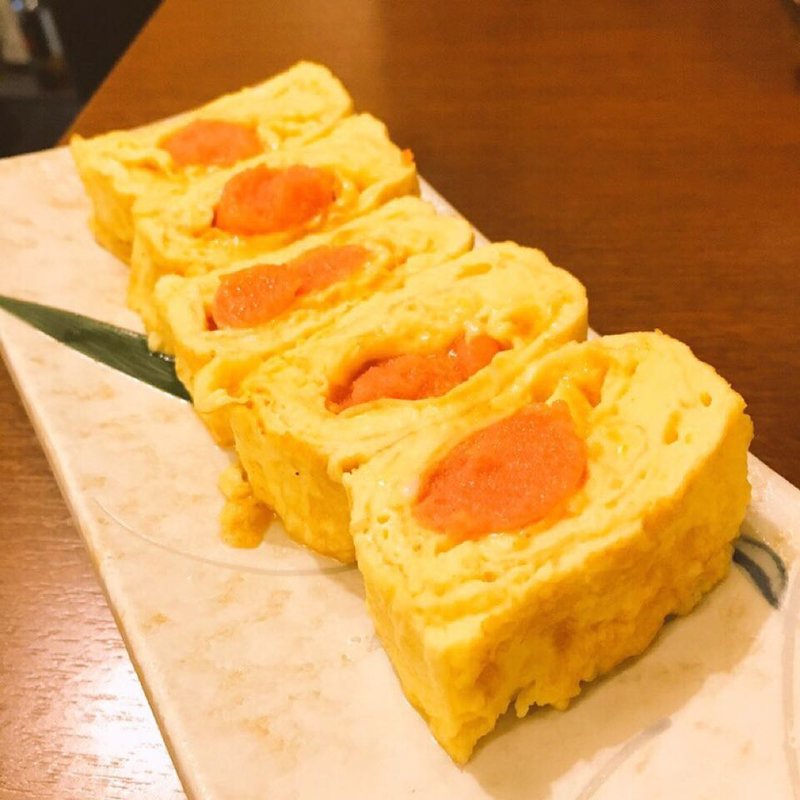 めんたいの玉子巻き(肴の萬屋 （肴のよろず屋）)