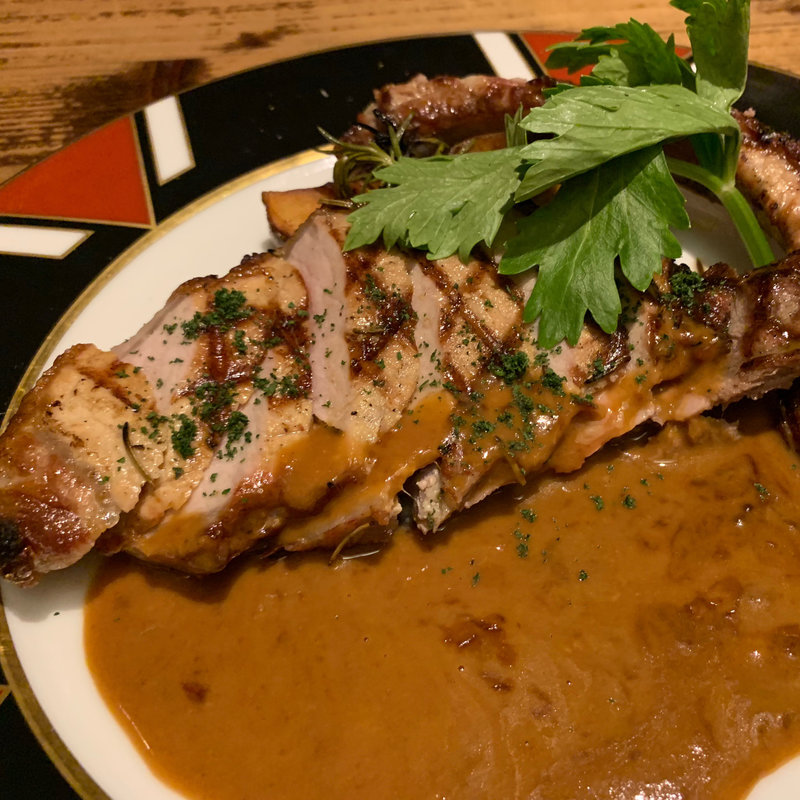 骨付きイベリコ豚のグリルバーニャカウダソース(奈多利庵)