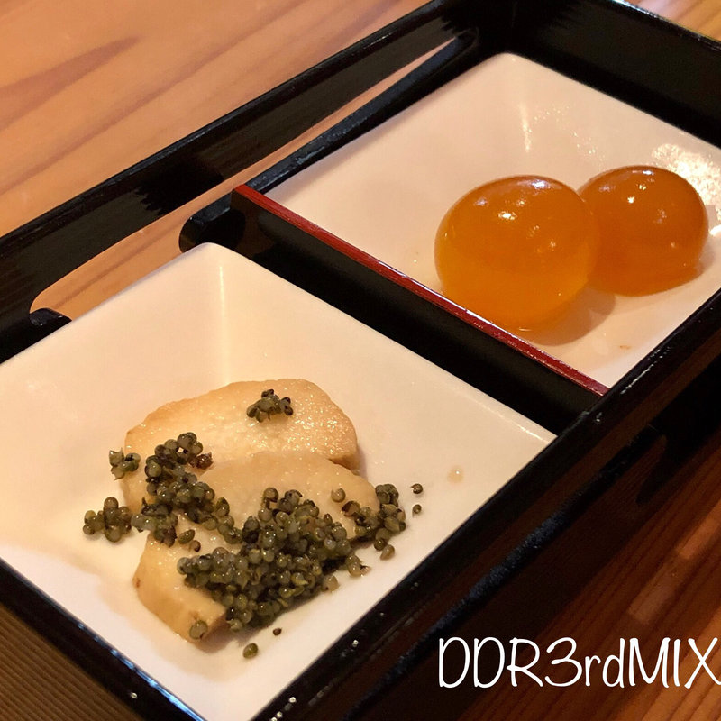 お通し（キンカン醤油漬けといぶりがっこ）(秋田比内地鶏生産責任者の店　本家あべや 秋田店 )