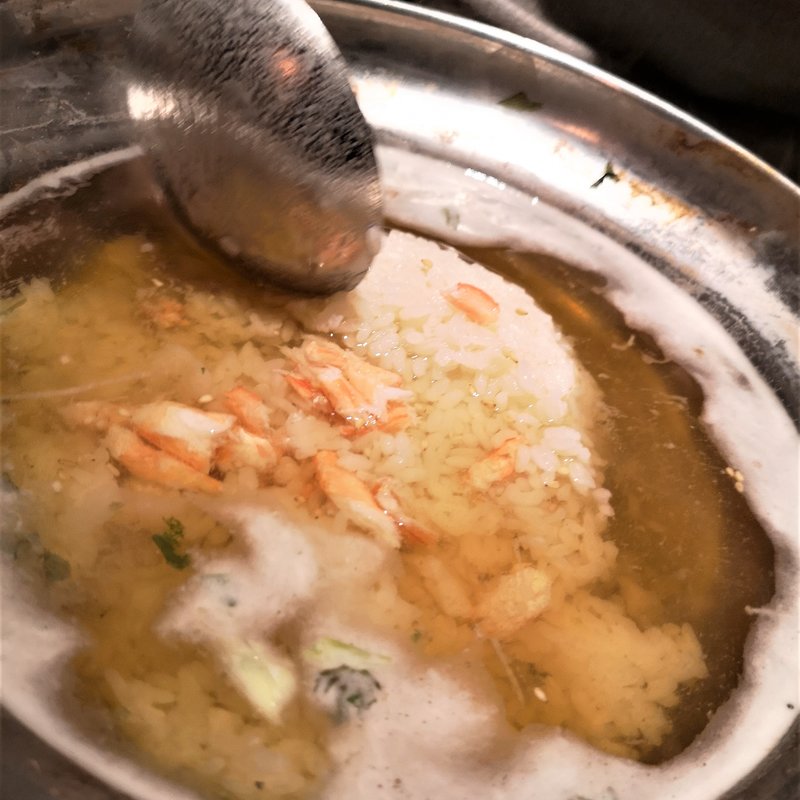 〆の蟹雑炊(蟹と大間のマグロ専門個室 東郷　天王寺アポロビル店)