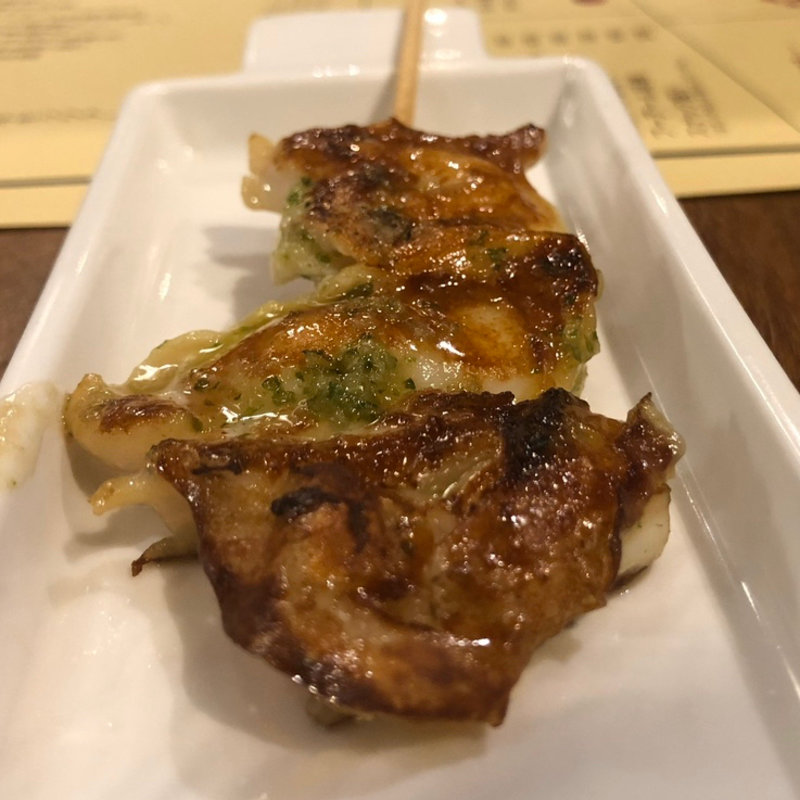 鍬焼き（つぶ貝のガーリックバター）(La Maison du 一升 Vin)