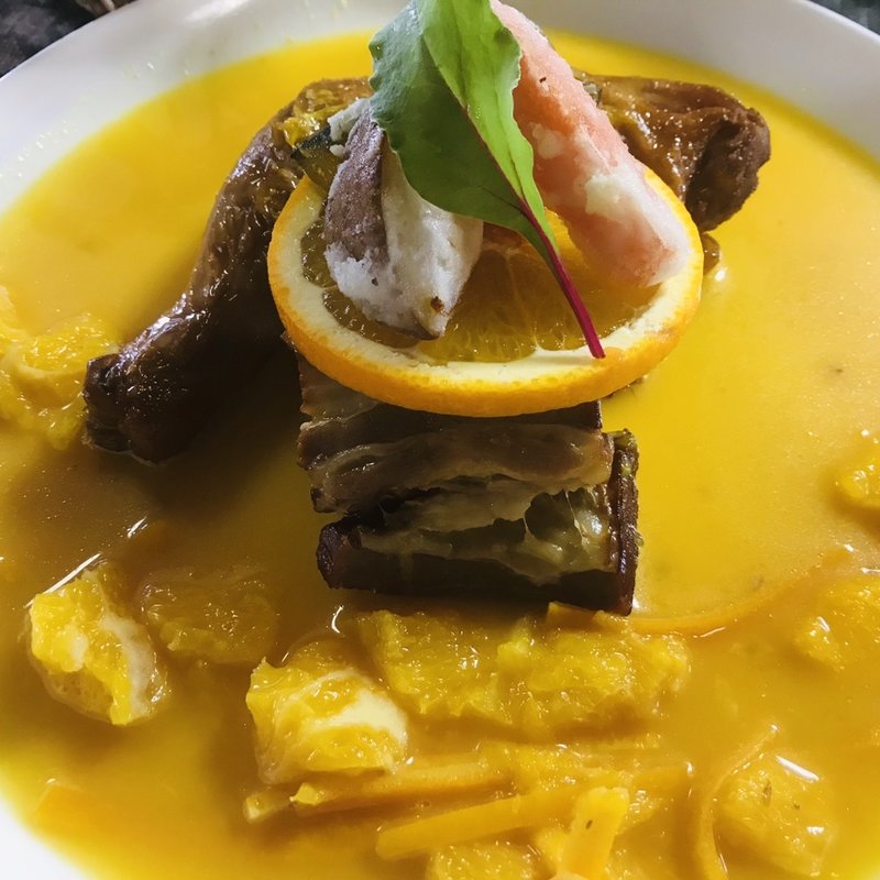 スモークチキンとベーコンのオレンヂソース煮(南保留太郎商店 燻製屋 （ナンポトメタロウショウテン クンセイヤ）)