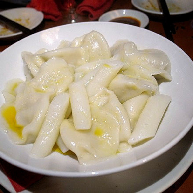 水餃子とトッポギの山椒オイル和え(蜃気楼)